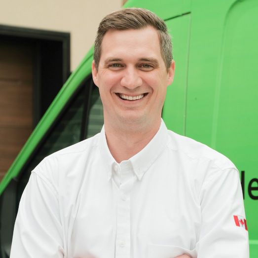The Comfort Group Plumbing technician standing by our famous green trucks in a residential neighbourhood. The Comfort Group Plumbing technician standing by our famous green trucks in a residential neighbourhood.